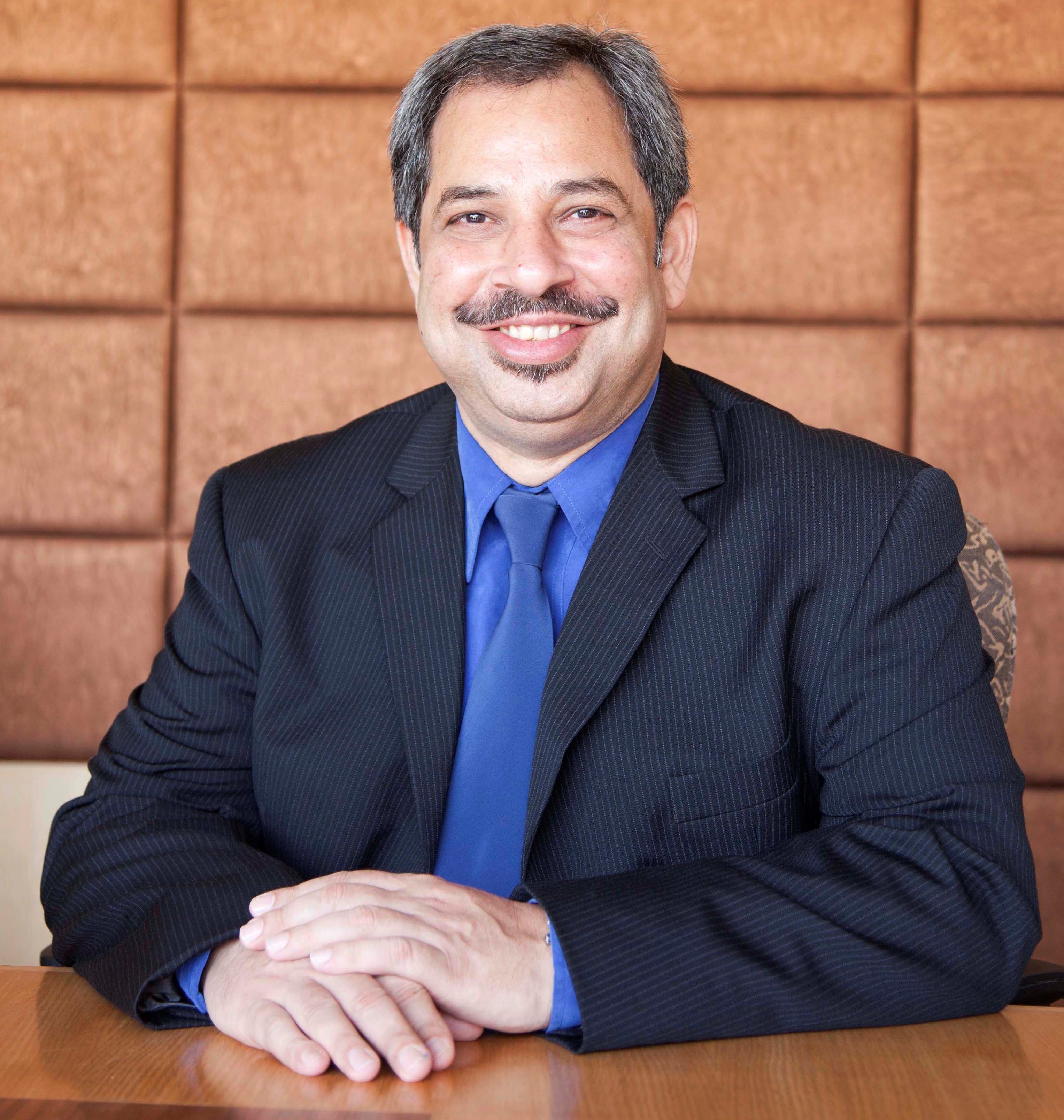 Dr. Cyrus Karkaria